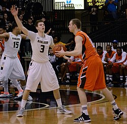 Defensive player guarding a specific player