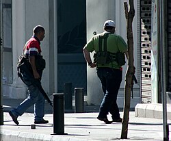 Armed fighters near the Crowne Plaza in Beirut on May 9