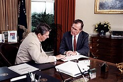 President Ronald Reagan and Vice President George H. W. Bush in the Oval Office in 1984