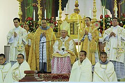 Archbishop Jose S. Palma with his assistant ministers during Pontifical High Mass