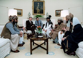 President Reagan meeting with Afghan Mujahideen leaders in the Oval Office in 1983