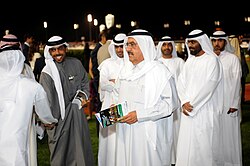 Men wearing the kandurah and the traditional ghotrah, held in place by an egal