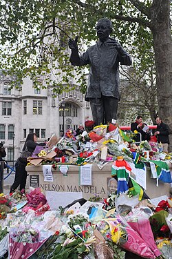Flowers left at the Mandela statue in London's Parliament Square following his death