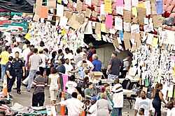 Houston, TX, September 3, 2005. A giant message board helps people locate friends and loved ones at the Reliant Center. Thousands of displaced citizens were moved from New Orleans to Houston in a FEMA organized bus program.