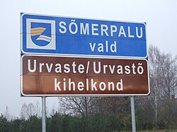 Road sign in Estonian and Võro