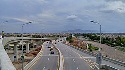 New flyovers, such as this one near the suburb of Hayatabad, have been constructed in recent years to improve traffic flow.