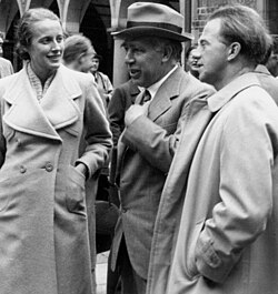 Elisabeth Heisenberg (left) conversing with Niels Bohr and Werner Heisenberg, 1937