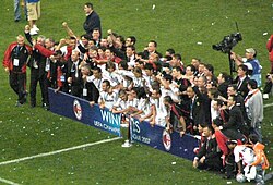 Ineligible to play having signed for the club mid season, Ronaldo (standing sixth from left) celebrated the 2007 UEFA Champions League triumph with his AC Milan teammates.
