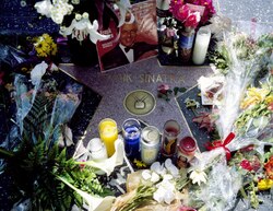 Fans covered flowers on Sinatra's star on the Hollywood Walk of Fame after he died in 1998