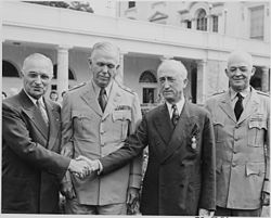 President Truman, Marshall, Secretary of State James F. Byrnes, and General Arnold at the White House, August 1945