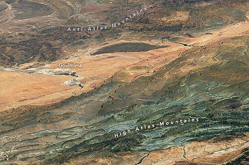 Satellite photograph of the High Atlas and Anti-Atlas Mountains. North is at the bottom; the city of Goulmima can be seen at center left.