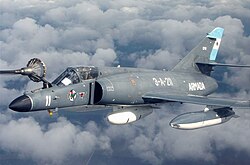 Super Étendard performing aerial refueling.