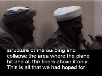 Frame of the video of bin Laden (right) released on 13 December 2001