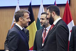 Macron, Syrian President Ahmed al-Sharaa, and Syrian Foreign Minister Asaad al-Shaibani, 24 April 2026