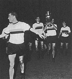 Suárez (foreground) celebrates the 1964–65 European Cup victory with Inter Milan teammates Facchetti, Peiró and Bedin.