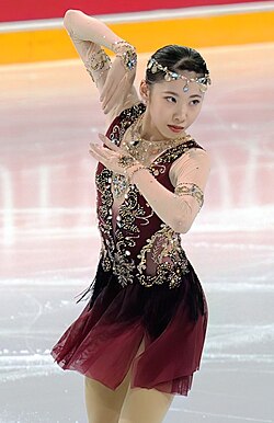 Figure skater, Rion Sumiyoshi, wearing a jeweled circlet as part of her costume.