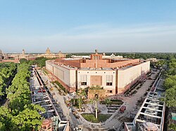Parliament House, New Delhi, India. The Commonwealth Charter states the Commonwealth's commitment to democracy, and many Commonwealth countries use the Westminster system.