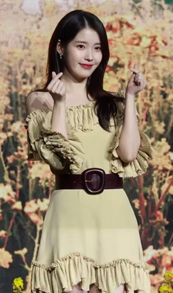 IU at a press conference for When Life Gives You Tangerines on March 5, 2025