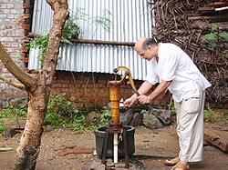 Hand pump to pump water from a well in a village near Chennai in India, where the well water might be polluted by nearby pit latrines.