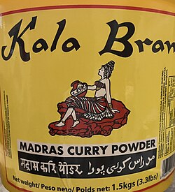 Trinidadian Hindustani text in the Devanagari and Perso-Arabic script on a bucket of curry powder from Trinidad and Tobago.