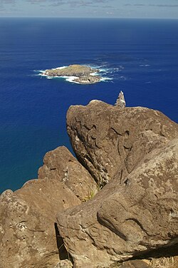 Petroglyphs on rocks at Orongo. Makemake at base and two birdmen higher up