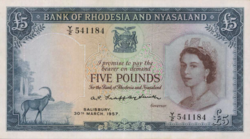 The Queen's portrait featured on Rhodesian banknotes and coins
