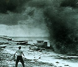 Man dwarfed by heavy surf near Miami