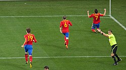 Villa celebrating his goal against Portugal along with teammates Fernando Llorente and Andrés Iniesta