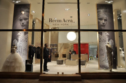 A photograph through the front window of Reem Acra's Beirut boutique.