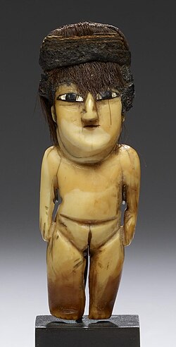 Nazca Female Effigy Figure, made of sperm whale tooth, shell and hair