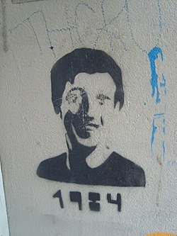 Graffiti in Berlin of Facebook founder Mark Zuckerberg; the caption is a reference to George Orwell's novel Nineteen Eighty-Four, December 2008
