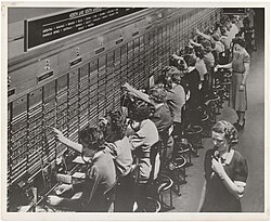 A large Bell System international switchboard in 1943
