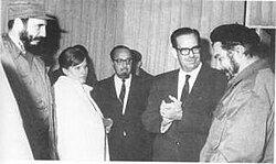 Guevara returning to Cuba at Rancho Boyeros airport on 14 March 1965. He is received by (left to right) Fidel Castro, Aleida March, Carlos Rafael Rodriguez, and Osvaldo Dorticos.