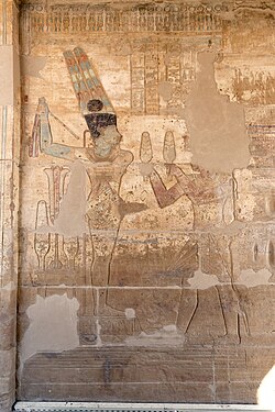 Relief showing Darius I offering lettuces to the Egyptian deity Amun-Ra Kamutef, Temple of Hibis
