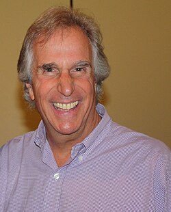 Henry Winkler portrays incompetent lawyer Barry Zuckerkorn.