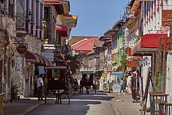 Kalesa (horse-drawn carriages) on Calle Crisologo