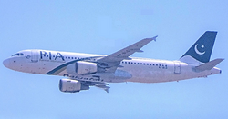 Pakistan International Airlines Flight 8303 with its ram air turbine deployed after both engines and generators failed following an attempted belly landing