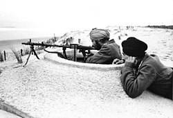 Troops of the Indische Legion guarding the Atlantic Wall in France in March 1944. Subhas Chandra Bose initiated the legion's formation, intended to serve as a liberation force from the British occupation of India.