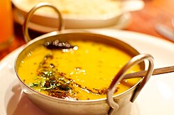 Food from plants: a dish of Dal tadka, Indian lentil soup