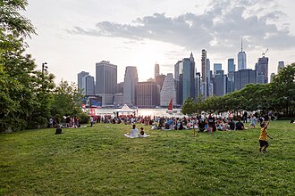 Audience preparing to watch "Deep Field: The Impossible Magnitude of our Universe" by Eric Whitacre in Brooklyn Bridge Park