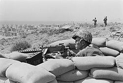 U.S. Marine sits in a foxhole outside Beirut during the 1958 Lebanon crisis.