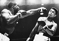 Clay dodges a punch from Liston