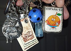 Naranjito, the official mascot of the 1982 tournament, is featured in this vintage collection of Spanish keychains.