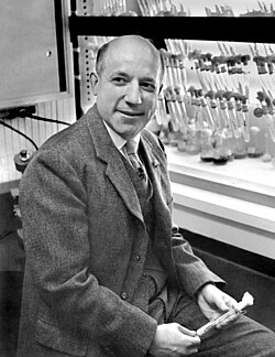 Melvin Calvin works in his photosynthesis laboratory.