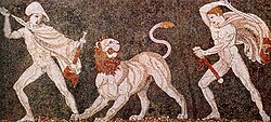 Alexander (left), wearing a kausia and fighting an Asiatic lion with his friend Craterus (detail); late 4th-century BC mosaic,[292] Pella Museum.