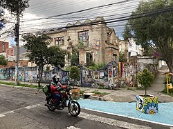 A motorcyclist on Valladolid Street in La Floresta, Quito