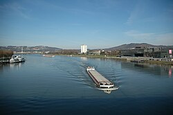 Cargo ships on the Danube river in Linz, Austria
