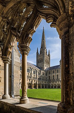 The view of the spire of Norwich Cathedral from the cloisters, in Norfolk, England