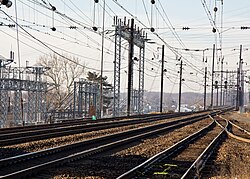Older variable-tension catenary in Perryville, MD, on the ex-Pennsylvania Railroad 25Hz system