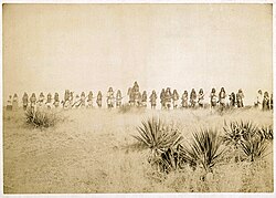Photo by C. S. Fly of Geronimo and his warriors, taken before the surrender to Gen. Crook, March 27, 1886, in the Sierra Madre mountains of Mexico. Fly's photographs are the only known images of Indian combatants still in the field who had not yet surrendered to the United States.[45]